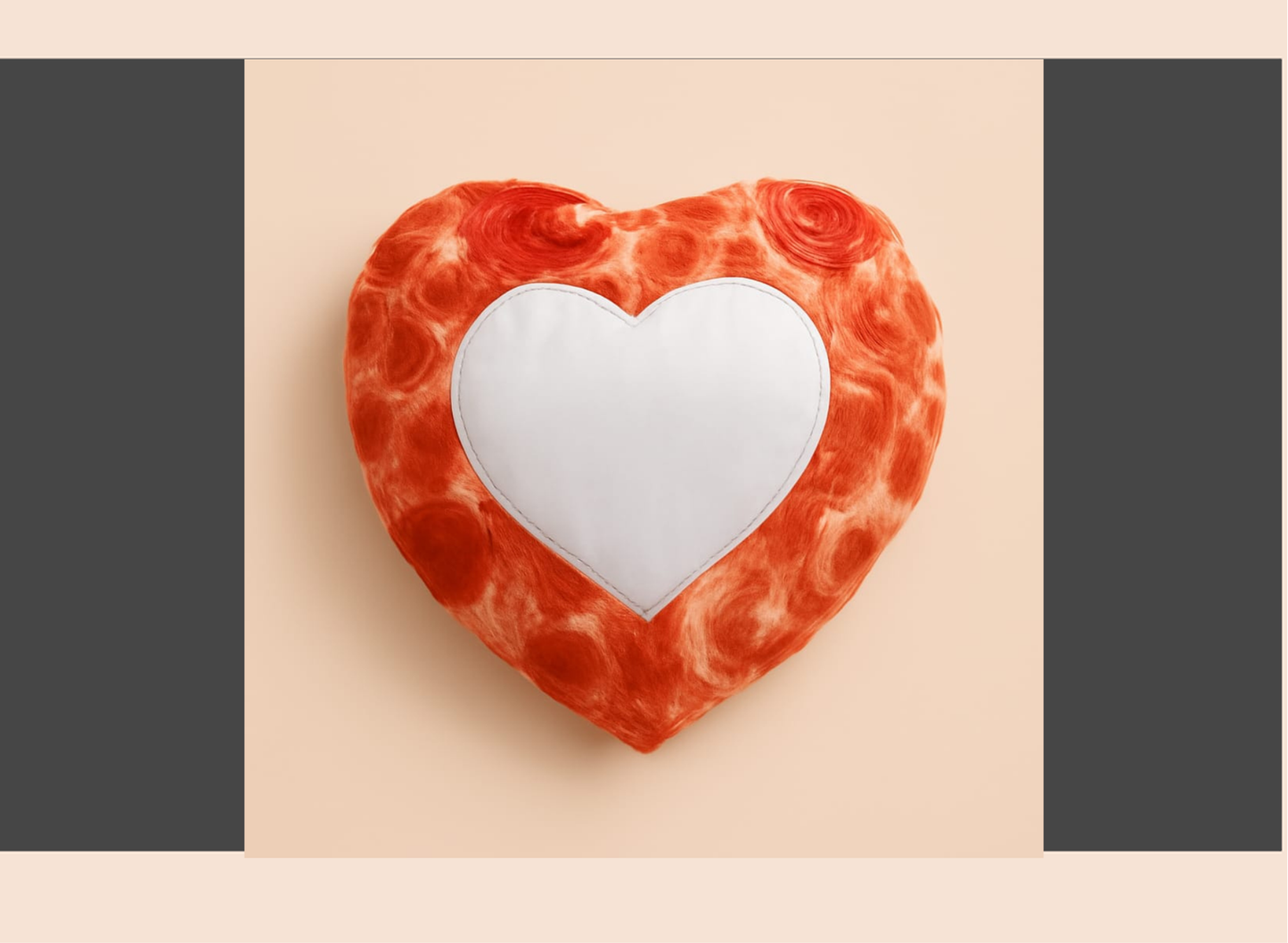 Heart-shaped pillow with red rose pattern on a beige background