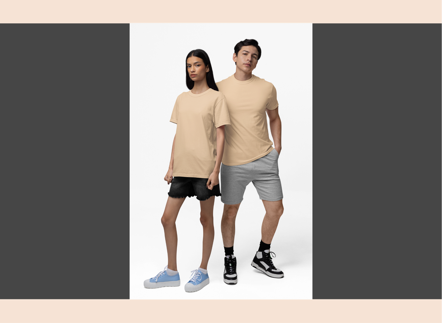 Two people wearing beige t-shirts and gray shorts on a white background