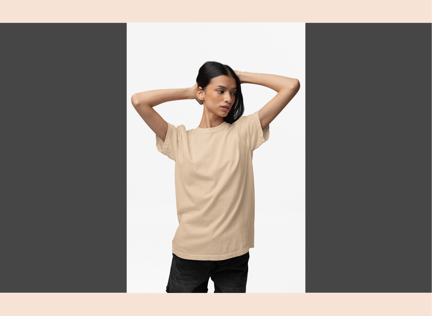 Woman wearing a beige t-shirt against a plain background
