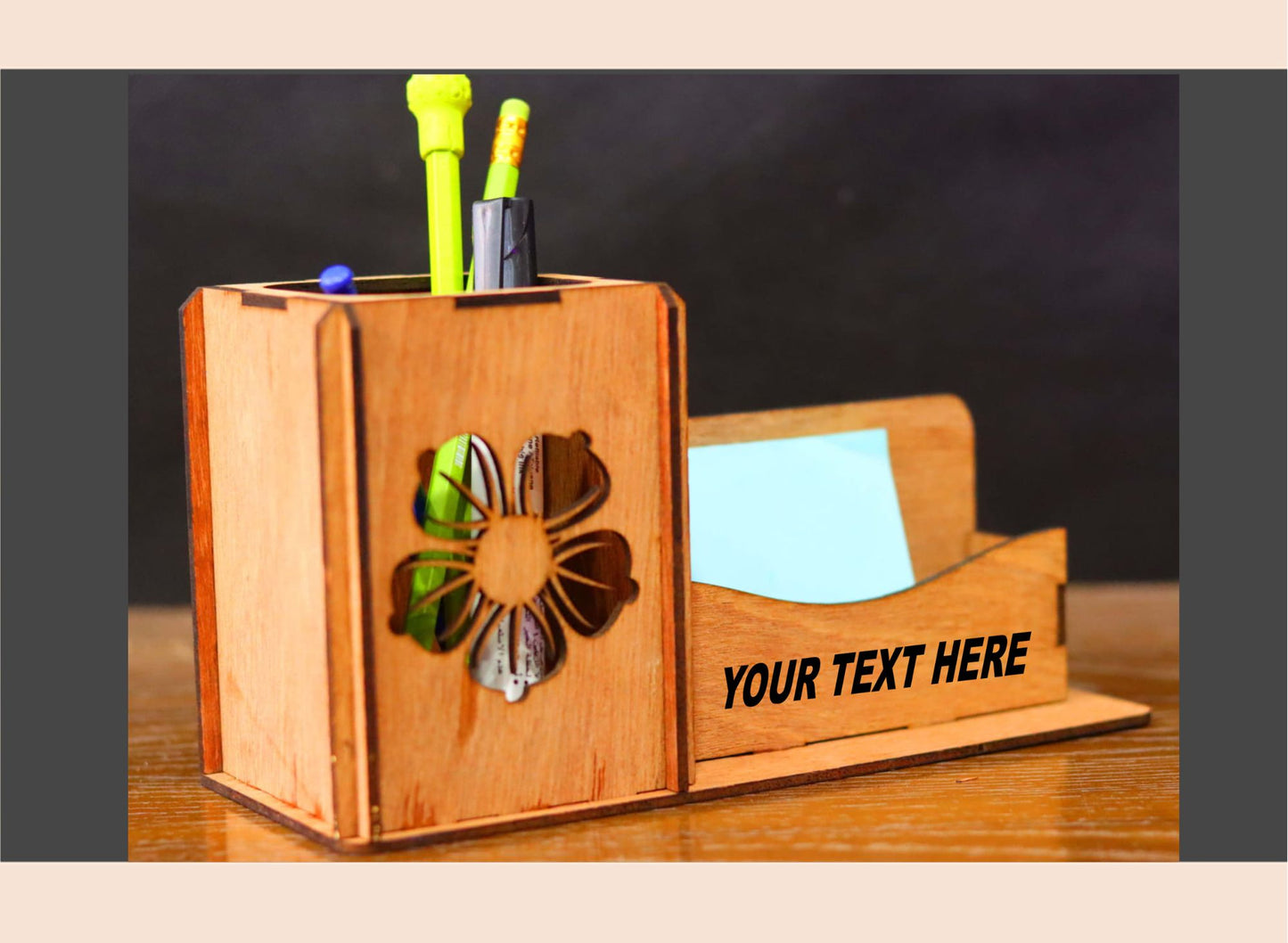 Wooden desk organizer with floral design and customizable text on a dark background