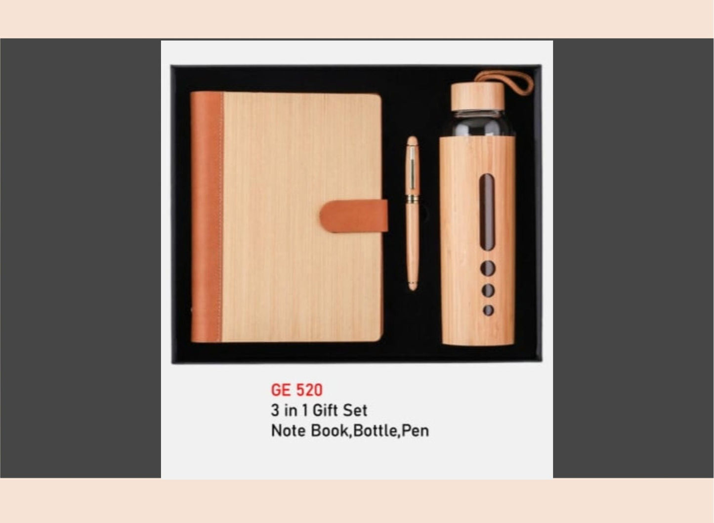 3-in-1 gift set with a notebook, water bottle, and pen on a gray background.