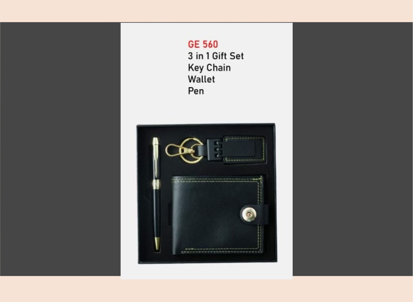 Black leather gift set with keychain, wallet, and pen on a gray background