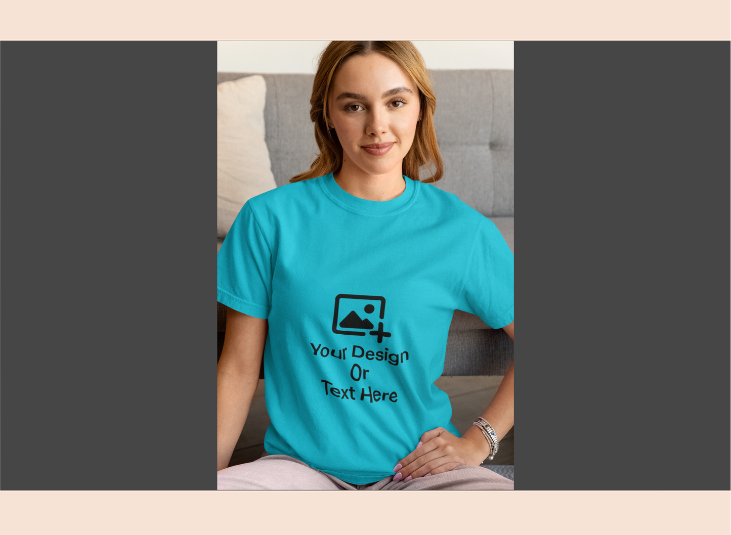 Person wearing a blue t-shirt with customizable design placeholder text.