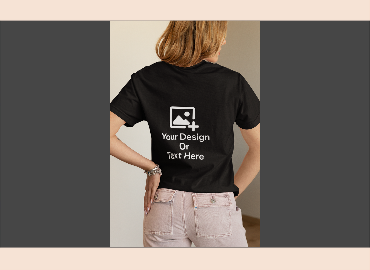 Black t-shirt with customizable text and image area on the back, worn by a person.