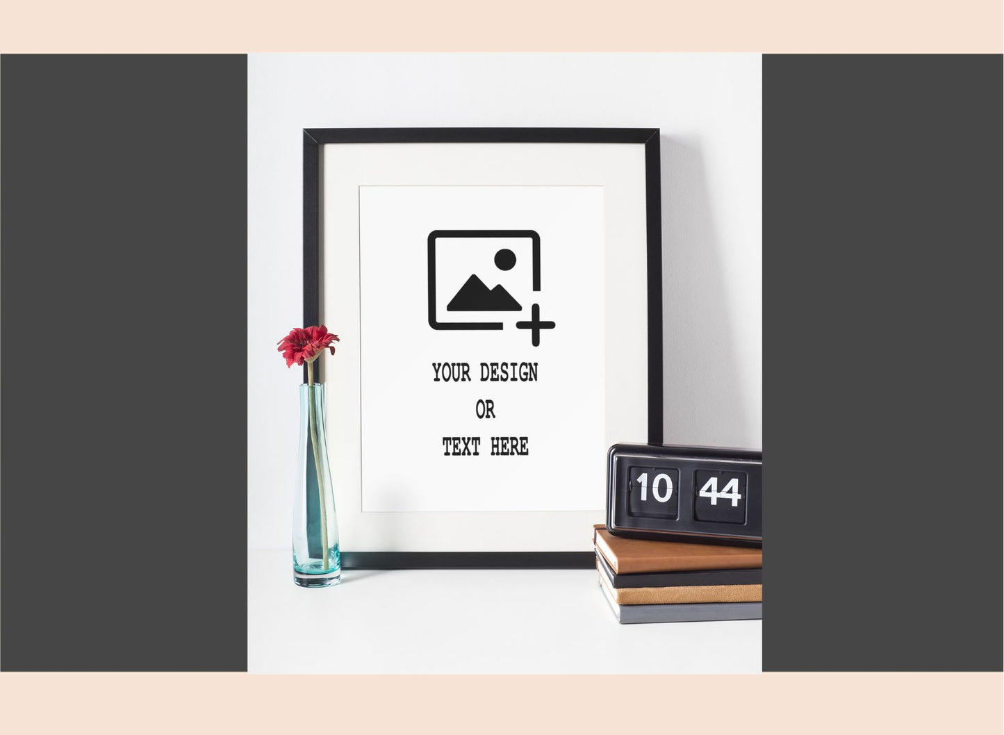 Framed mockup with customizable text and design area, placed on a white surface with decorative items.