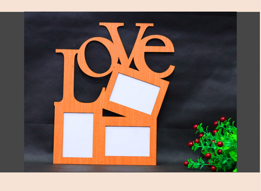 Orange 'LOVE' photo frame with white backgrounds on a dark background with Christmas decorations.
