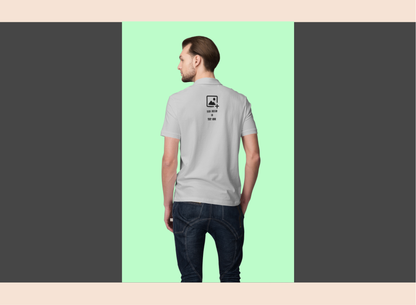 Man in a white shirt and black pants holding a coffee cup on a city street.