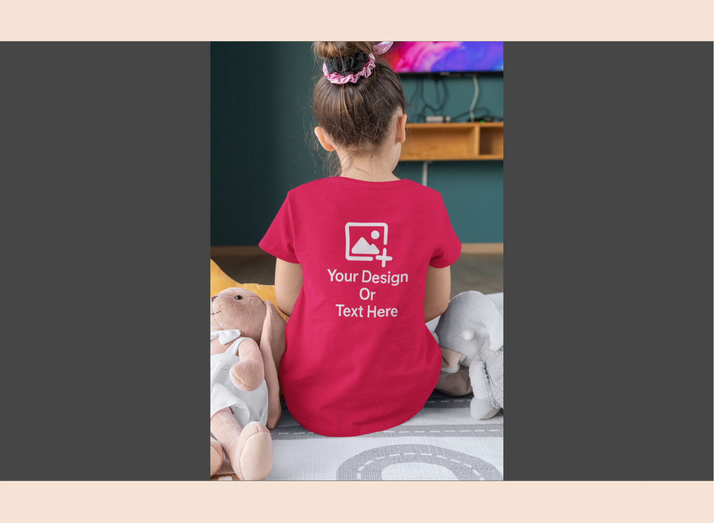 Child wearing a red t-shirt with customizable text and design area.
