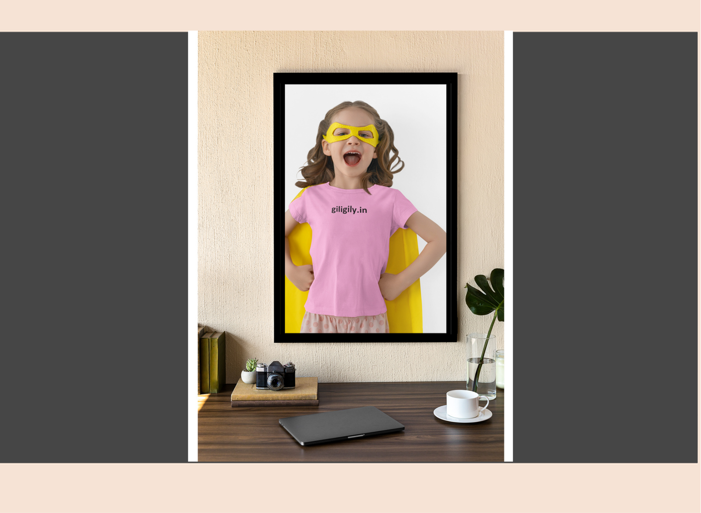 Framed picture of a child wearing a pink shirt with 'nigily.in' on a wall.