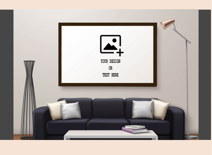 Framed artwork with customizable text or design on a wall above a sofa.