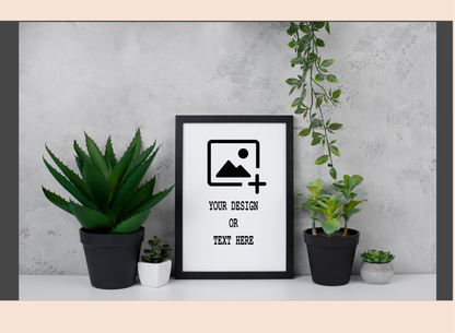Framed mockup with plants on a gray wall background