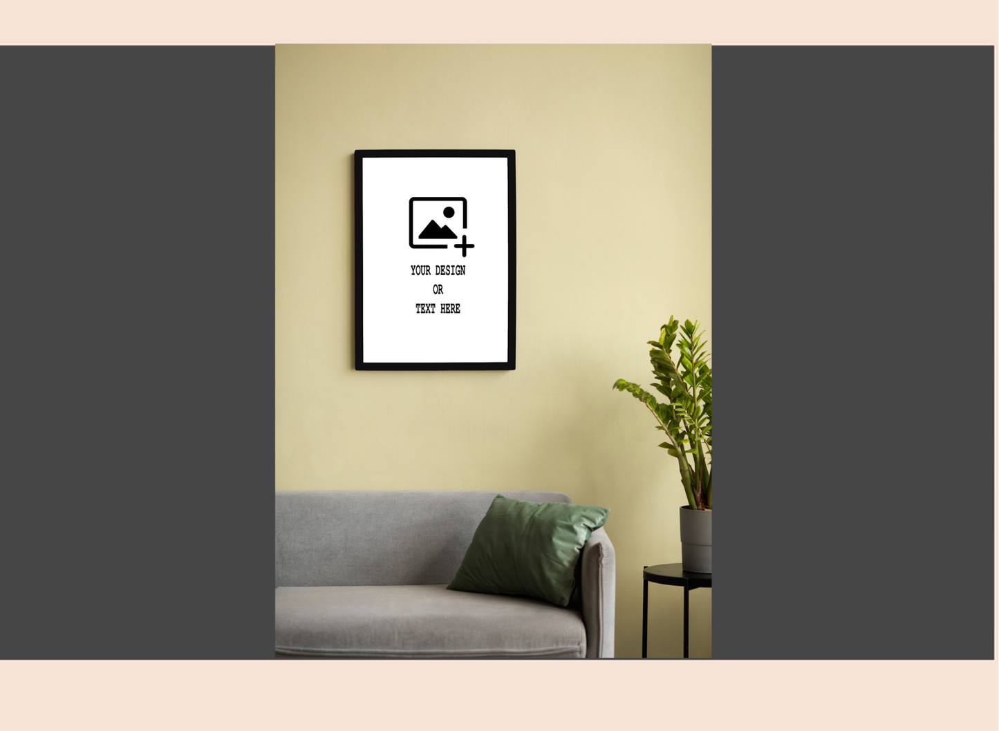 Framed artwork on a wall above a gray sofa with a green pillow.