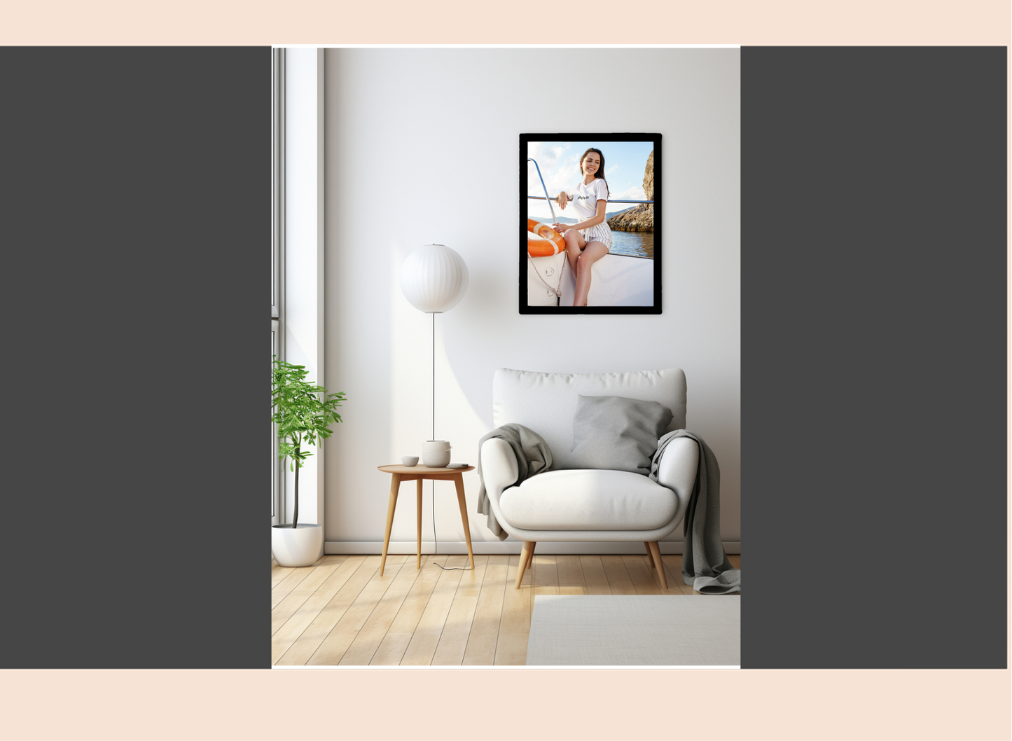 Living room with a white armchair, small table, and framed picture on the wall.