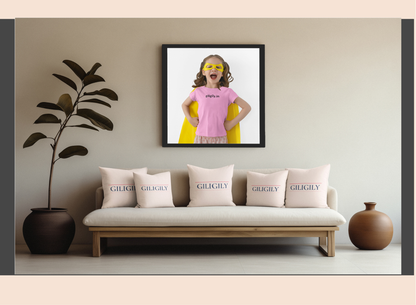 Sofa with 'GIGILY' pillows, framed picture of a child on the wall, and decorative plants.