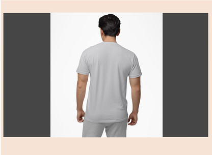 Man wearing a gray t-shirt and pants on a white background