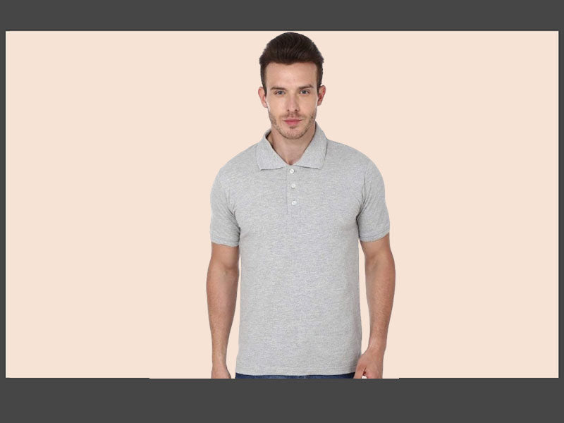 Man wearing a grey polo tshirt.