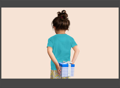 Child holding a gift box on a beige background
