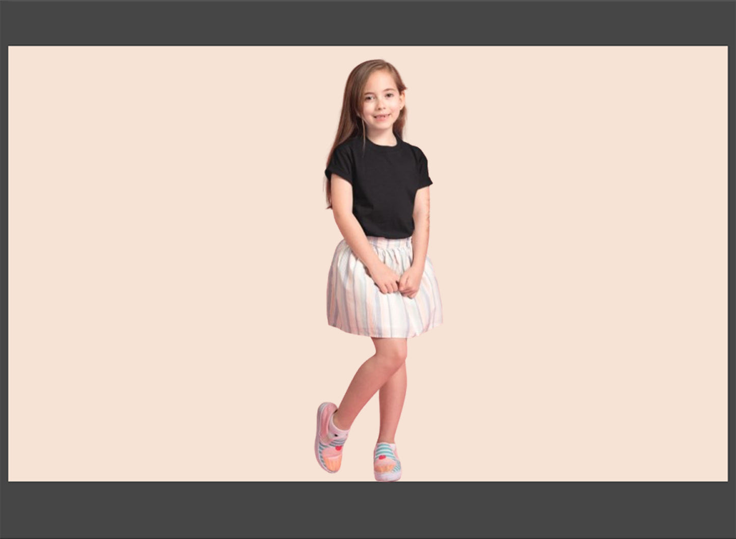 Young girl wearing a black top and white skirt on a beige background