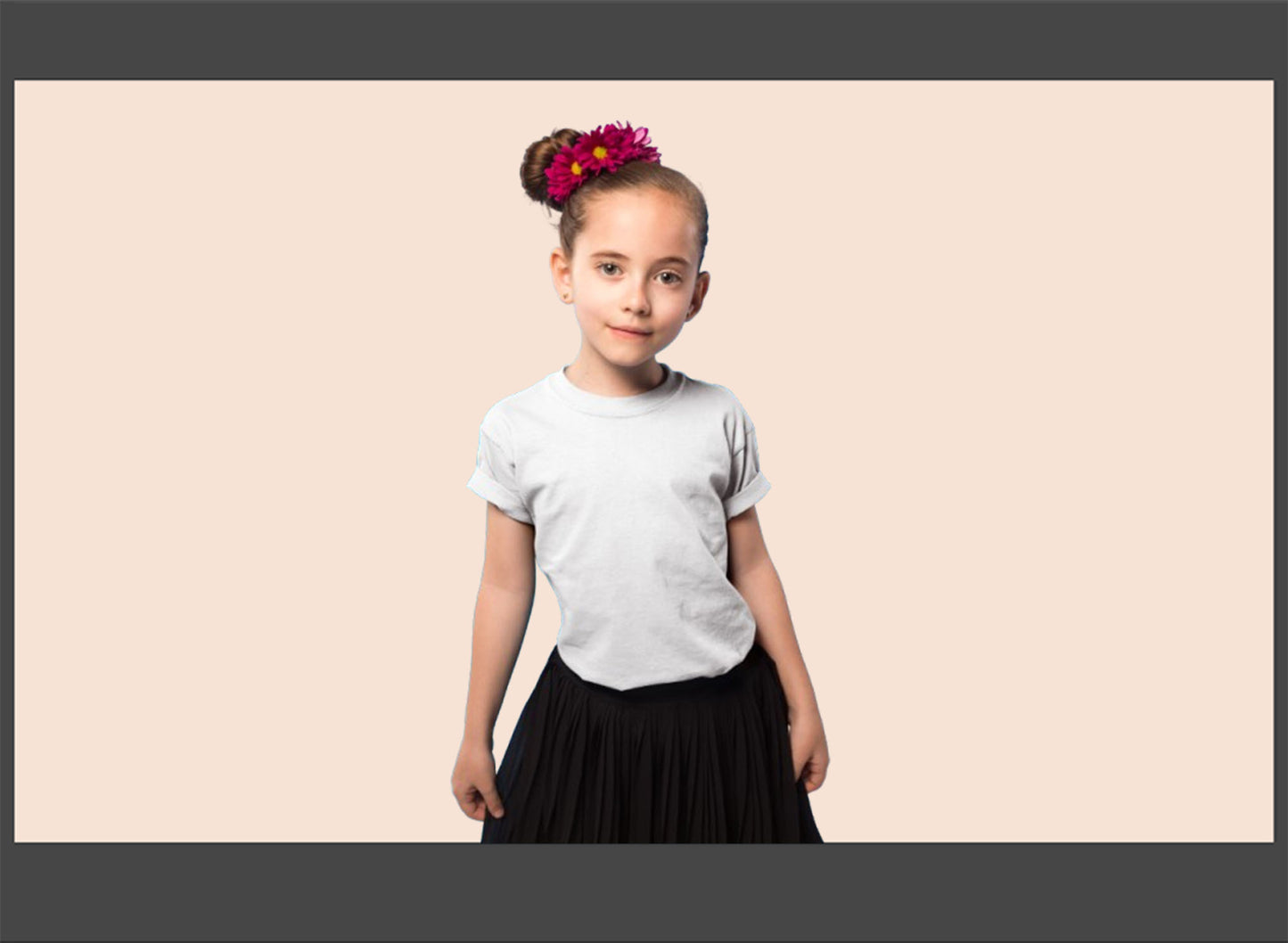 Young girl wearing a white t-shirt and black skirt with a pink background