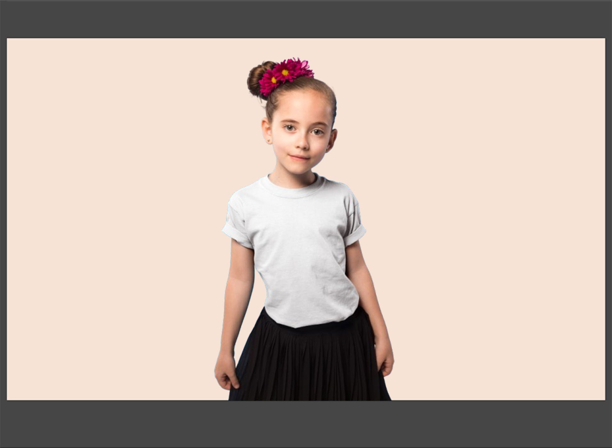 Young girl wearing a white t-shirt and black skirt with a pink background