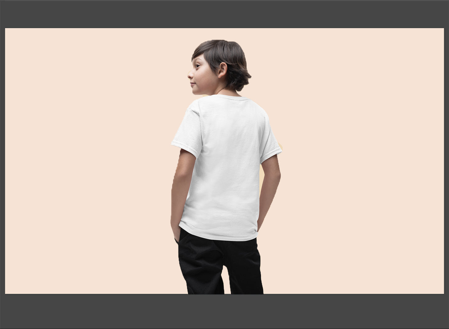 Child wearing a white t-shirt and black pants on a beige background