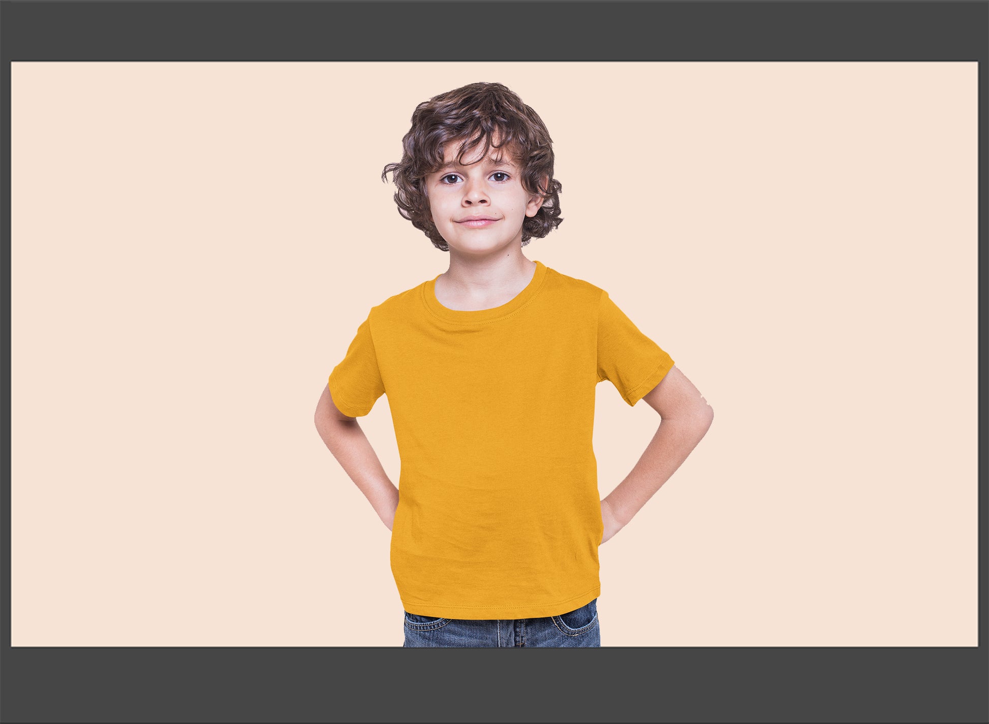 Child wearing a yellow shirt against a beige background