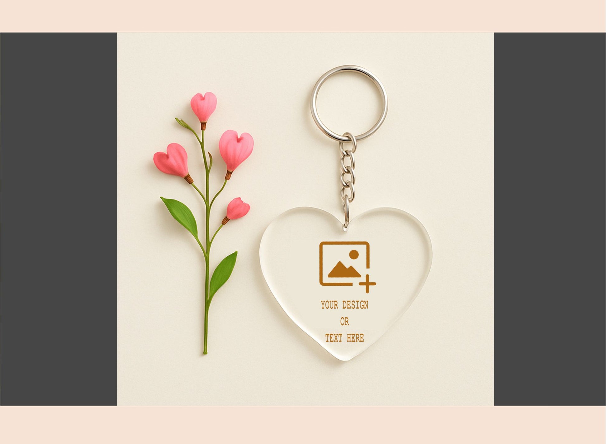 Heart-shaped keychain with floral design on a light pink background