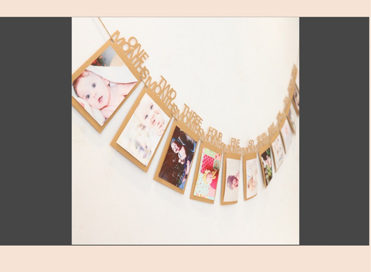 Round wooden photo frame with cut-out numbers and small photos inside on a white background