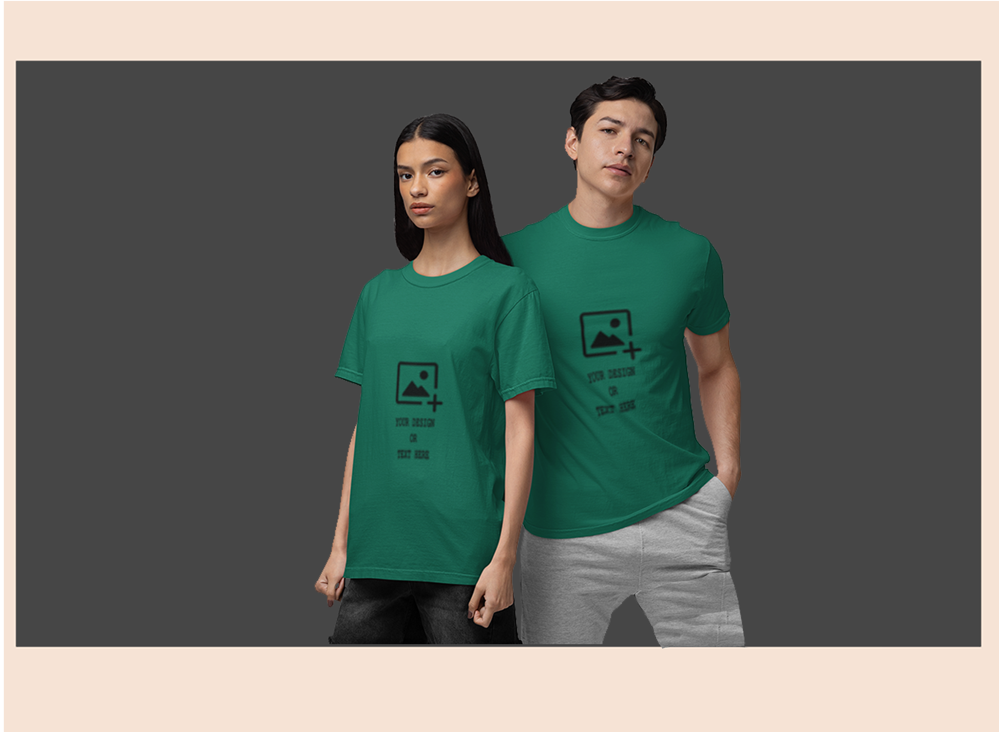 Two people wearing green t-shirts with a logo on a dark background