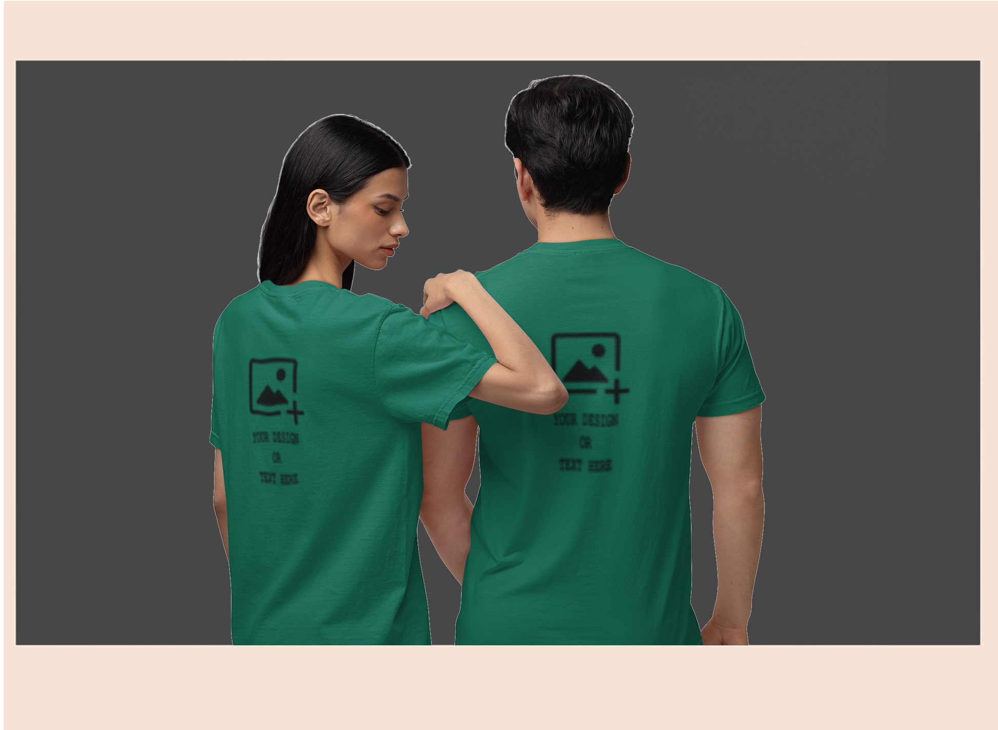 Two people wearing green t-shirts with a graphic design on a dark background