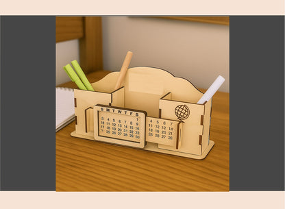 Wooden desk organizer with calendar, pen holder, and markers on a wooden surface.