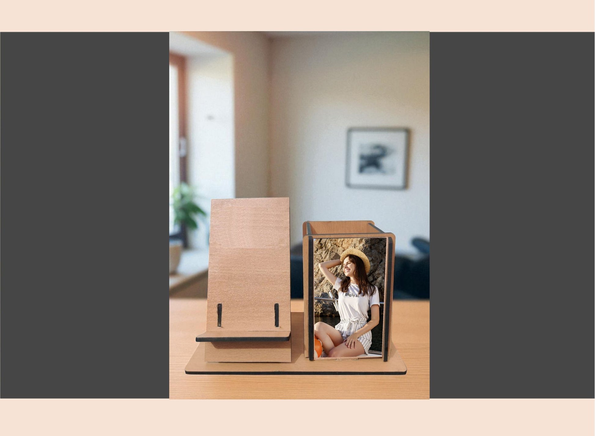 Wooden photo frame with a picture of a couple on a table in a room.