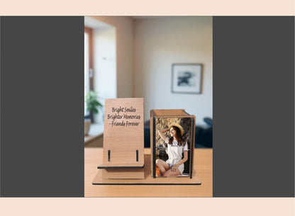 Wooden photo frame with a photo of a couple on a wooden surface.