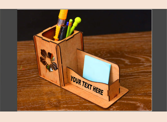 Wooden desk organizer with stationery items on a wooden surface