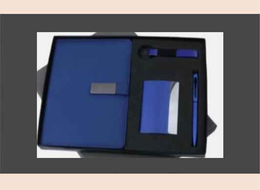 Blue notebook and pen set in a black box on a white background