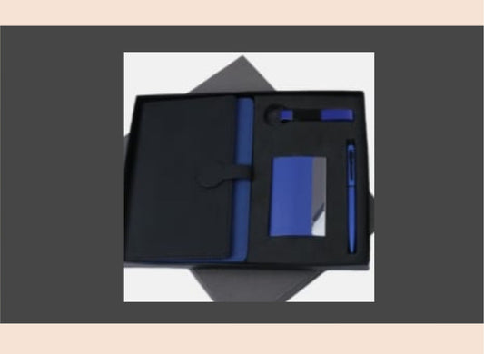 Black and blue office set with pen and notepad on a light gray background