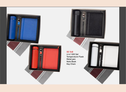 Set of four items including a blue temperature flask, red metal pen, black notebook, and white keychain in gift boxes.
