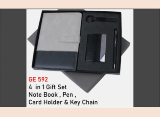 4-in-1 gift set with notebook, pen, card holder, and keychain in a black box.