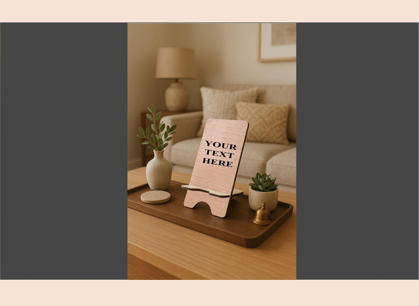 Decorative setting with a wooden tray, plant, and small easel on a table.