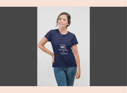 Person wearing a navy blue t-shirt with a design on a plain background