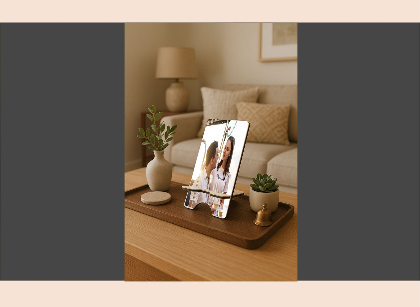Decorative photo frame with a couple on a stand in a living room setting.