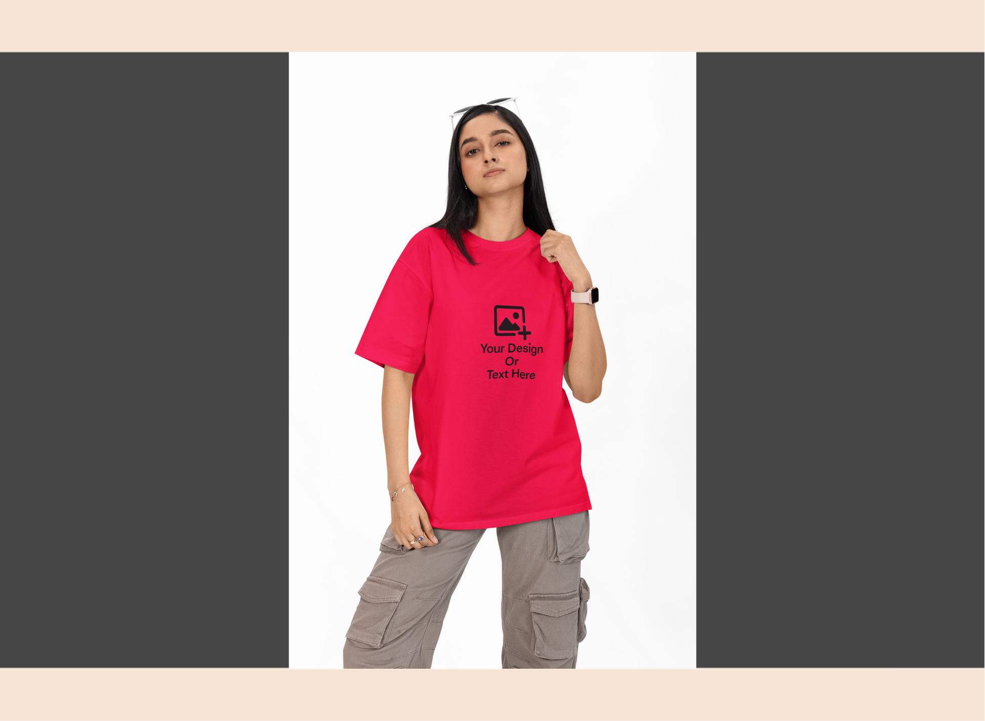 Person wearing a red t-shirt with a black logo on a white background