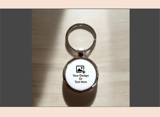 Personalizable keychain with customizable text on a metallic surface