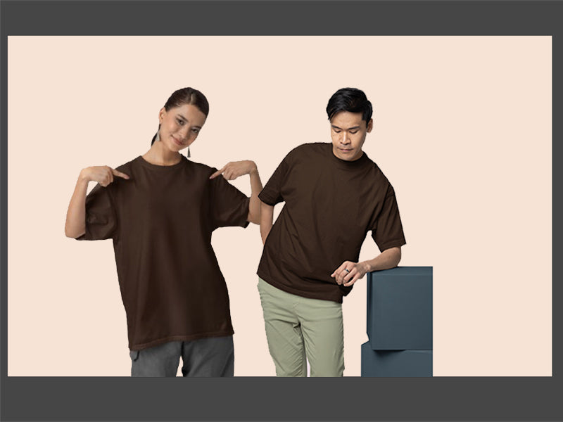 Woman and man wearing a brown top on a beige background