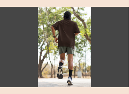Person running on a path with trees in the background