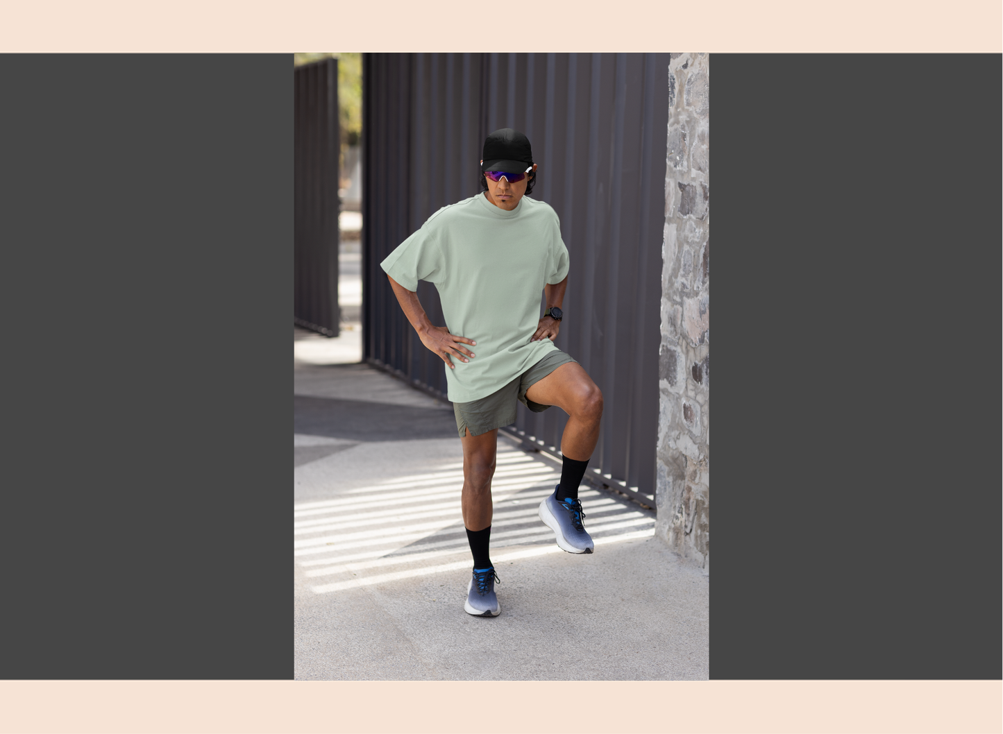 Person in athletic wear posing outdoors on a sunny day