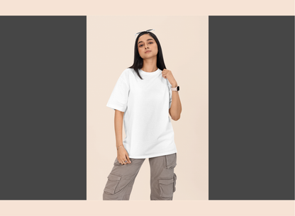 Person wearing a white t-shirt and gray cargo pants on a beige background