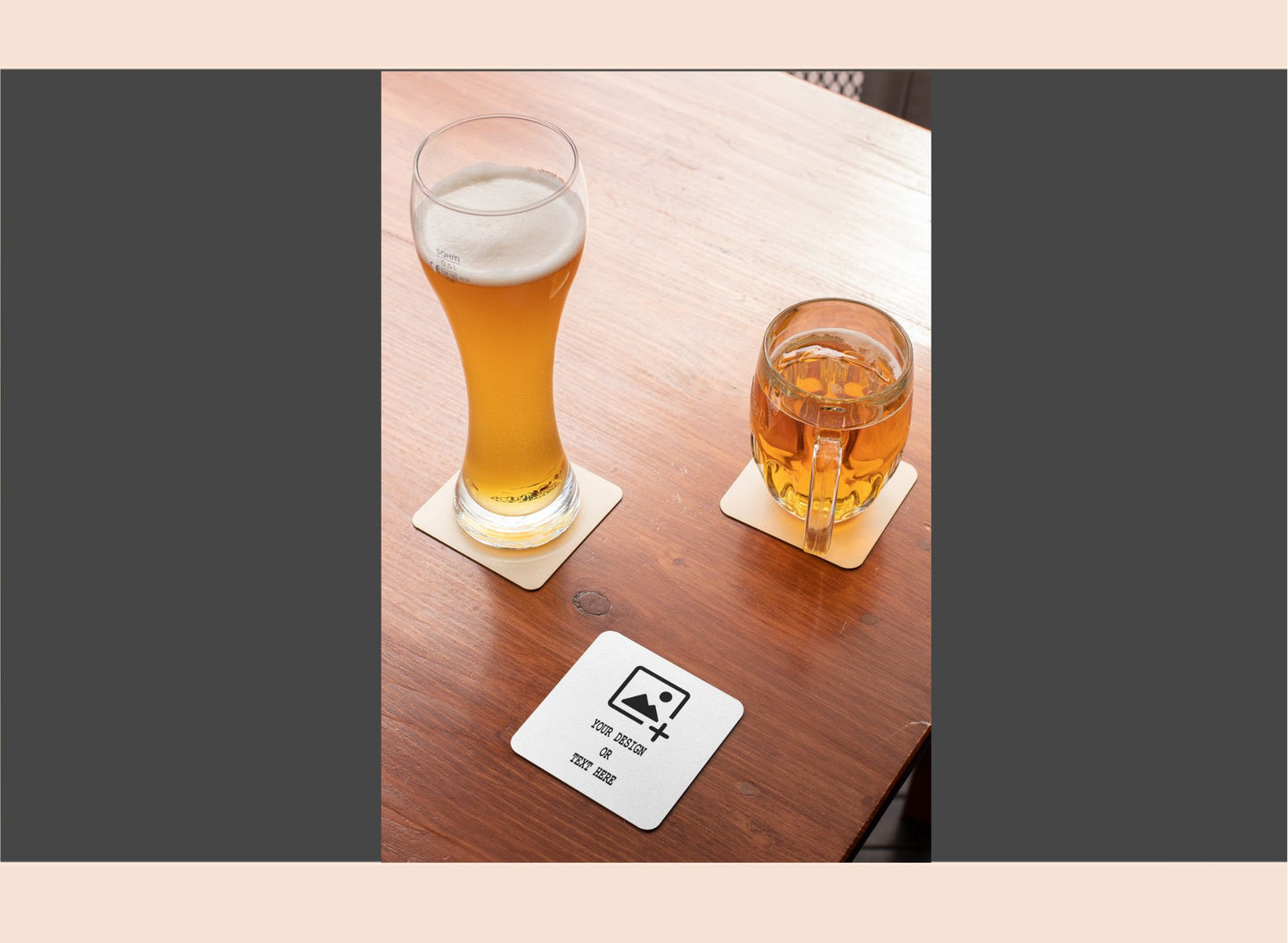 Two glasses of beer on a wooden table with coasters.
