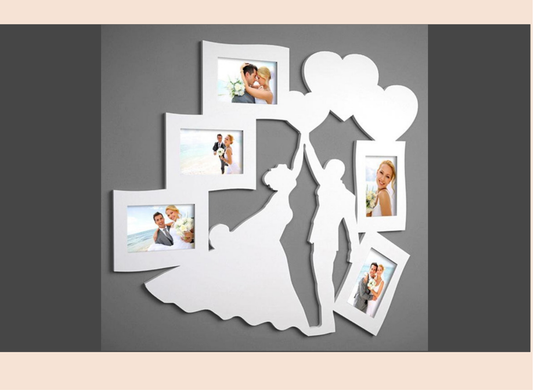 Decorative wall art with silhouette of a bride and groom holding balloons and framed photos.