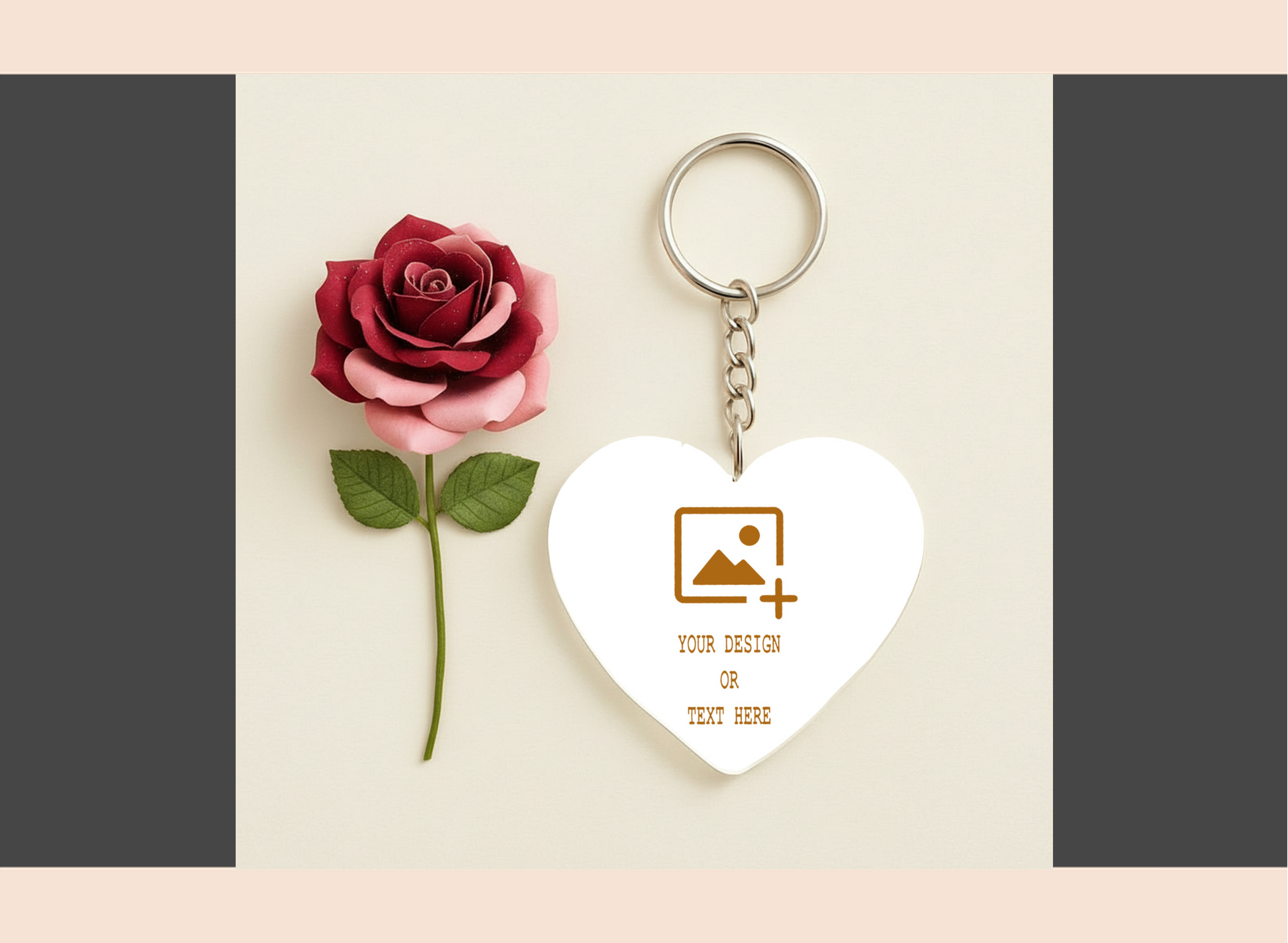 Heart-shaped keychain with customizable design area next to a red rose on a light background
